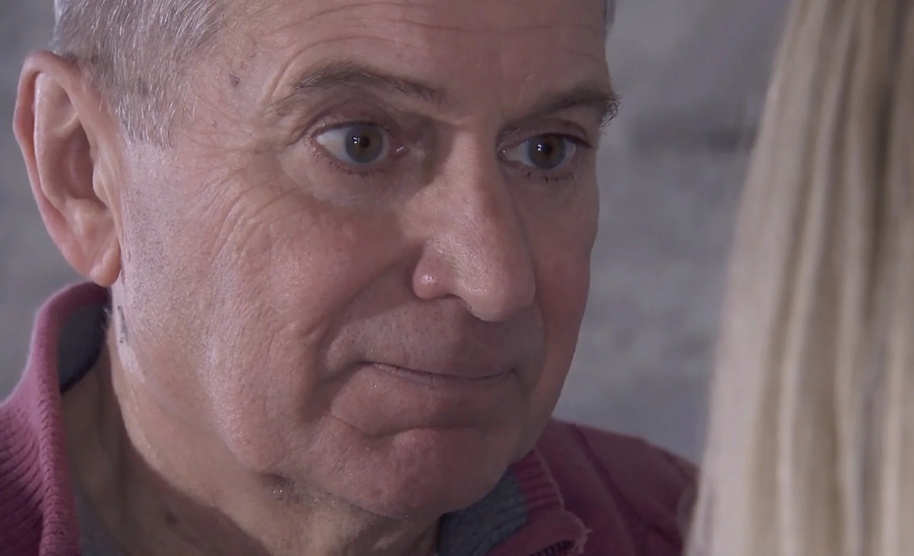 Froggy Black (John Middleton) looks unsettled as he stares at Clare Devine in Hollyoaks