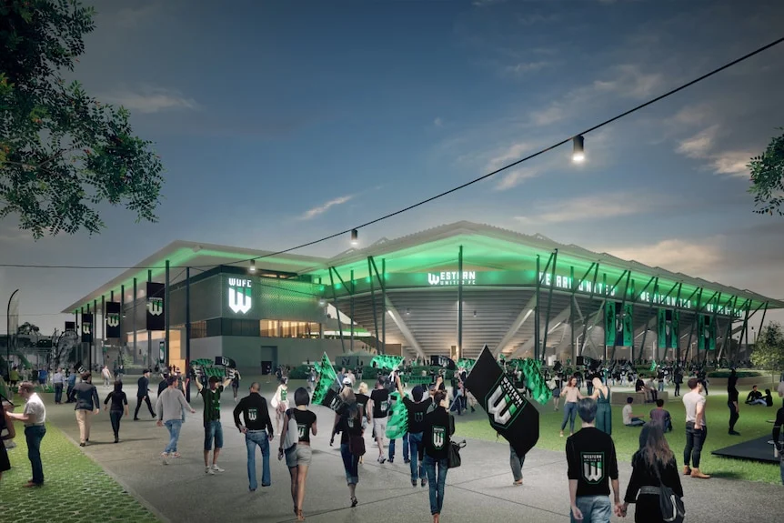 A large stadium with fans walking outside.