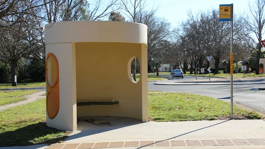 A round bus shelter.