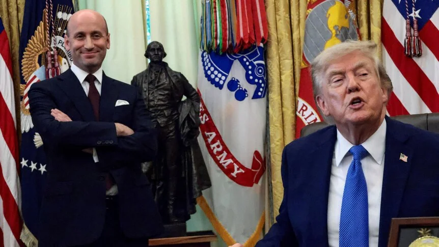 Donald Trump speaks while signing an executive order on immigration