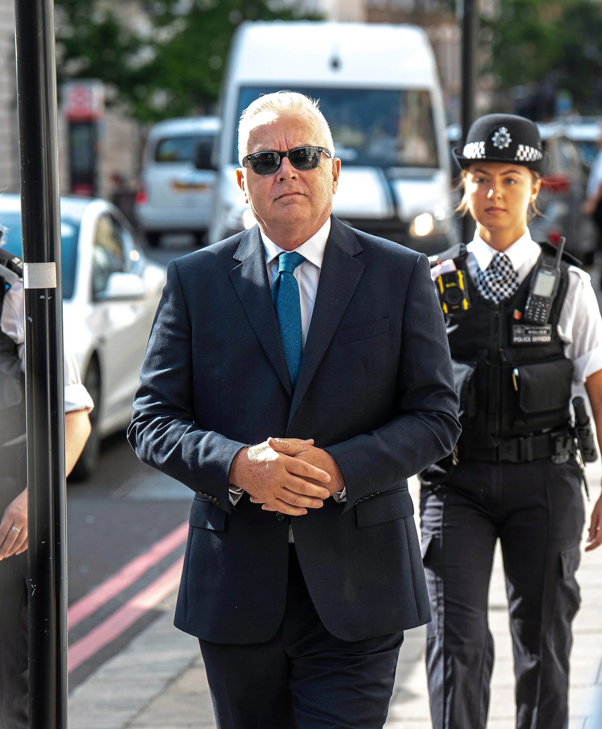 Newsreader Huw Edwards arrives at Westminster Magistrates this morning