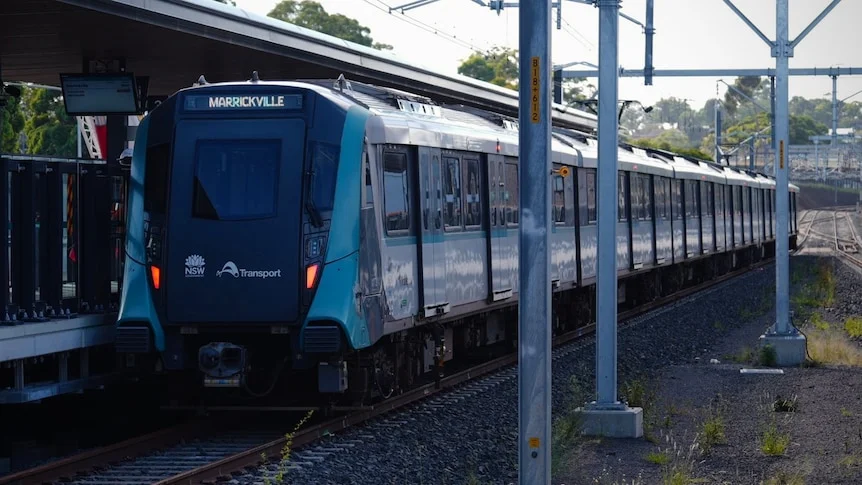 A blue metro station with the words Marrickville.