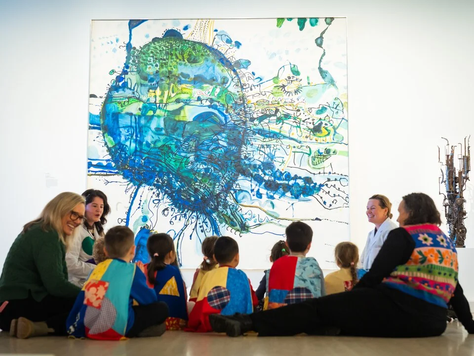 preschool students at Art Gallery of NSW wearing super hereo capes and surrounded by art