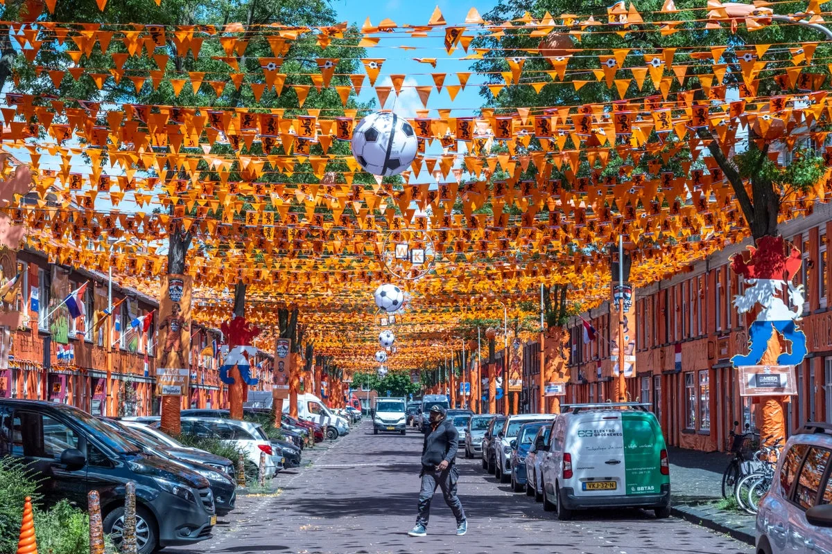 Netherlands Soccer Fans Celebrate World Cup in The Hague's Vibrant Orange Street