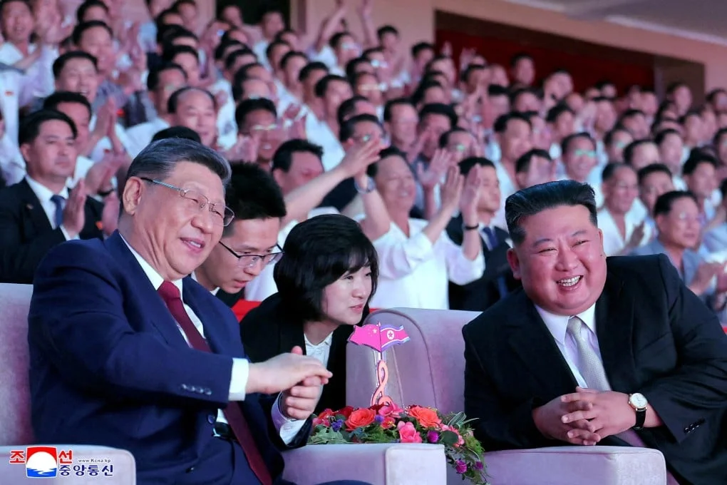 Kim Jong-un and Xi Jinping watch a performance in Pyongyang during the Chinese leader’s visit. Photo: Reuters