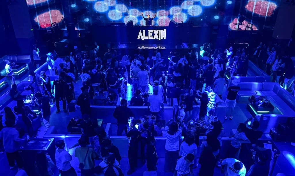 People dance in a nightclub in Yangon in the early hours of May 16. Photo: AFP People dance in a nightclub in Yangon in the early hours of May 16. Photo: AFP