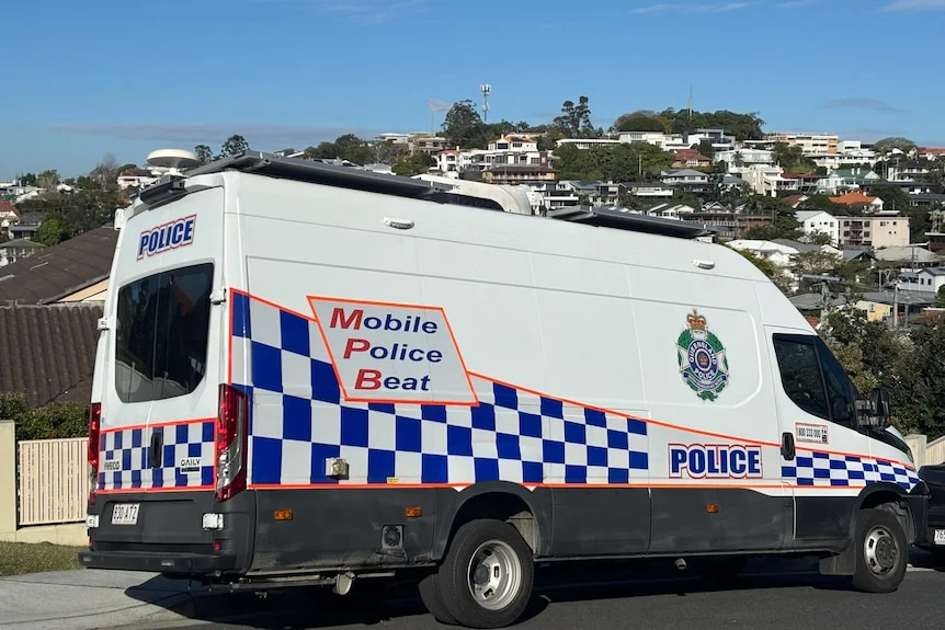 Mobile police beat van parked in a suburban street