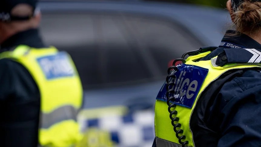 Victorian police officer from behind
