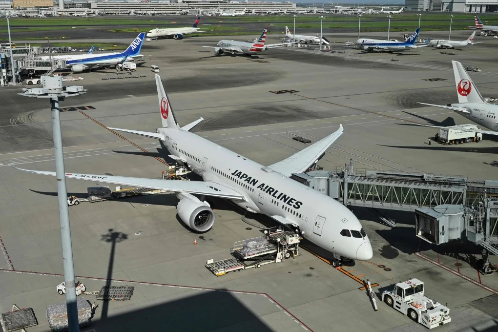 Japan Airlines and All Nippon Airways passenger jets at Tokyo International Airport in Haneda. Photo: AFP