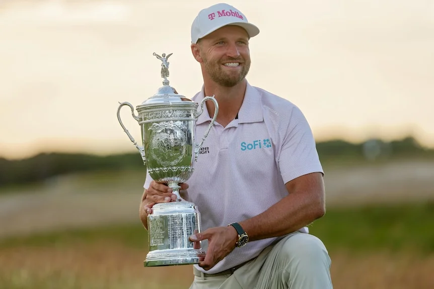 Wyndham Clark poses with the US open trophy.