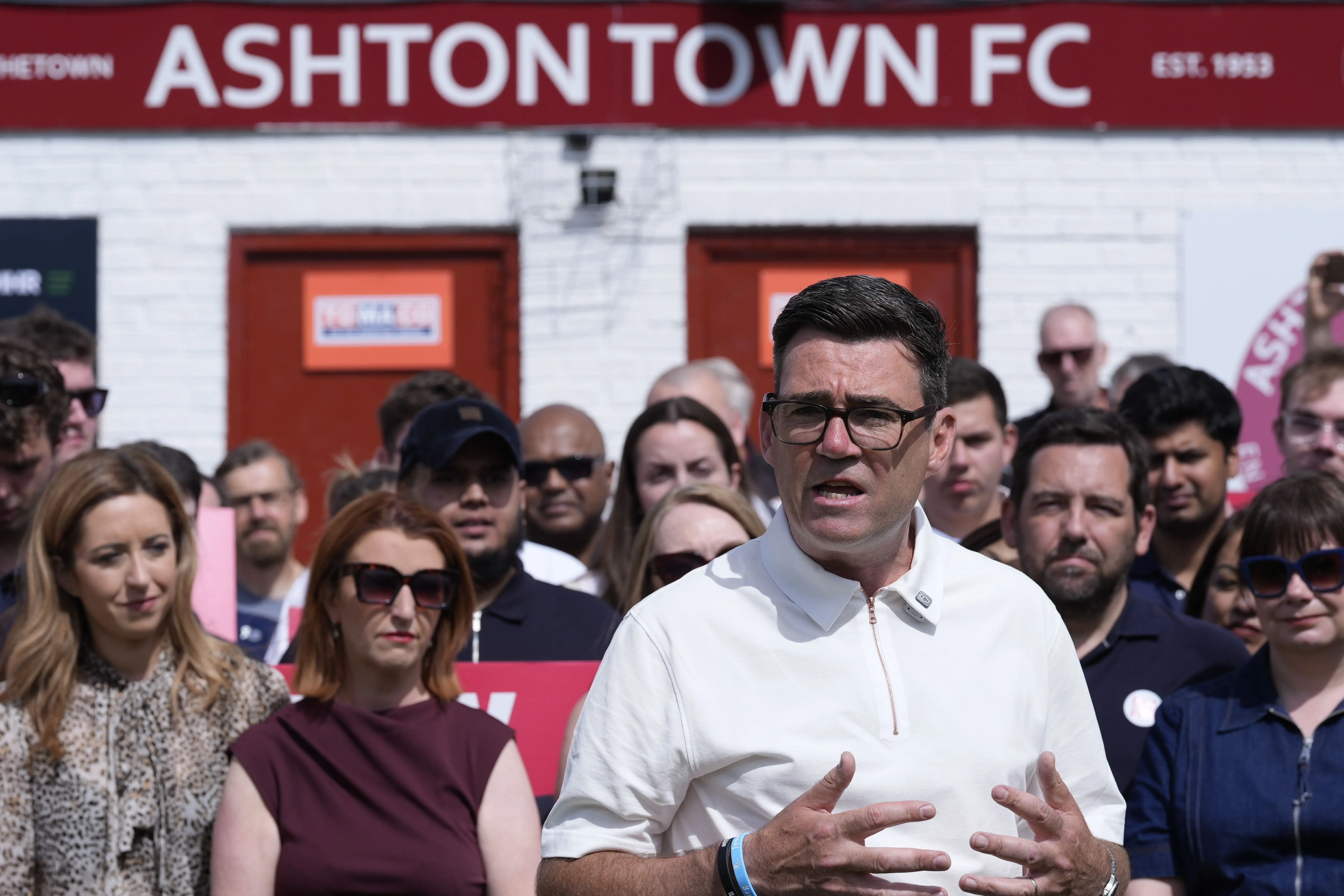 Andy Burnham making a speech in front of supporters at Ashton Town FC after winning the Makerfield by-election
