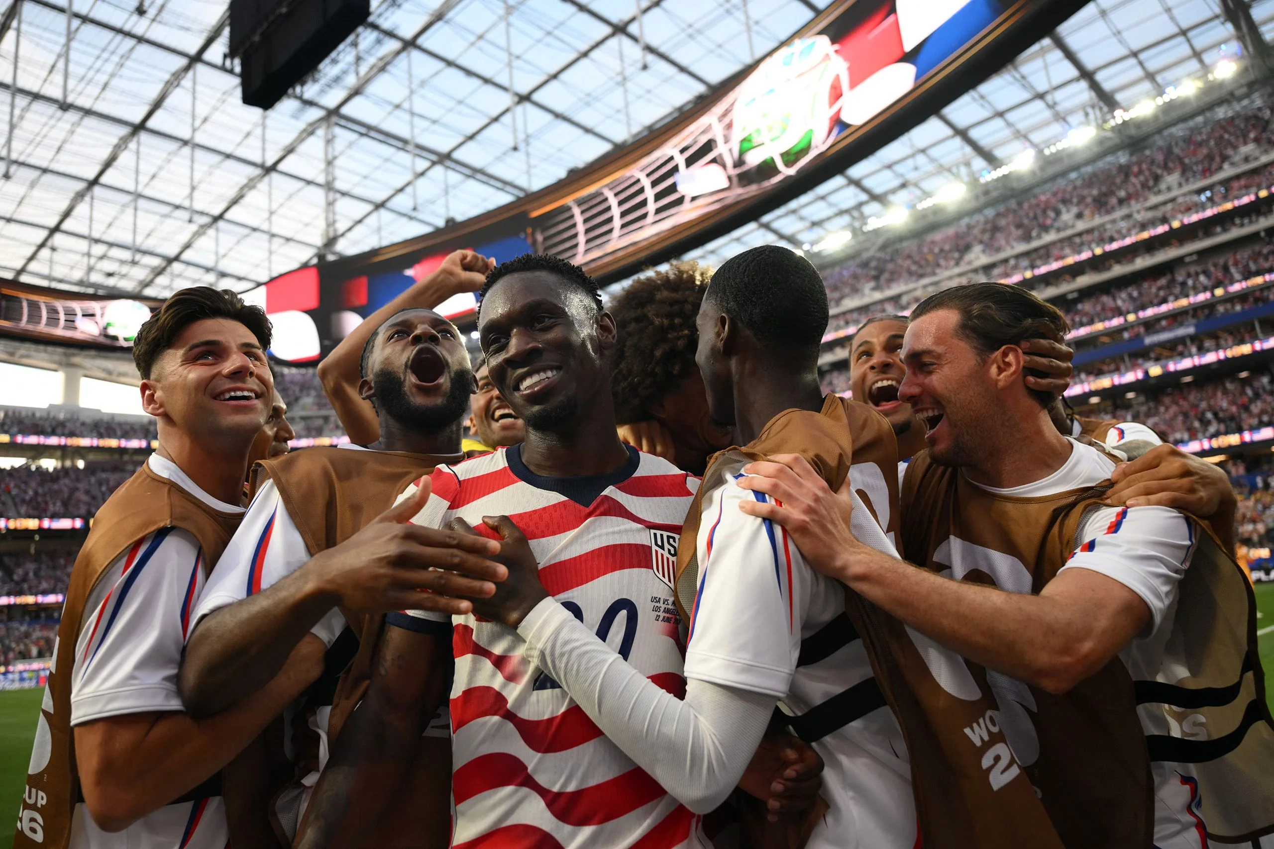 Soccer players celebrating.