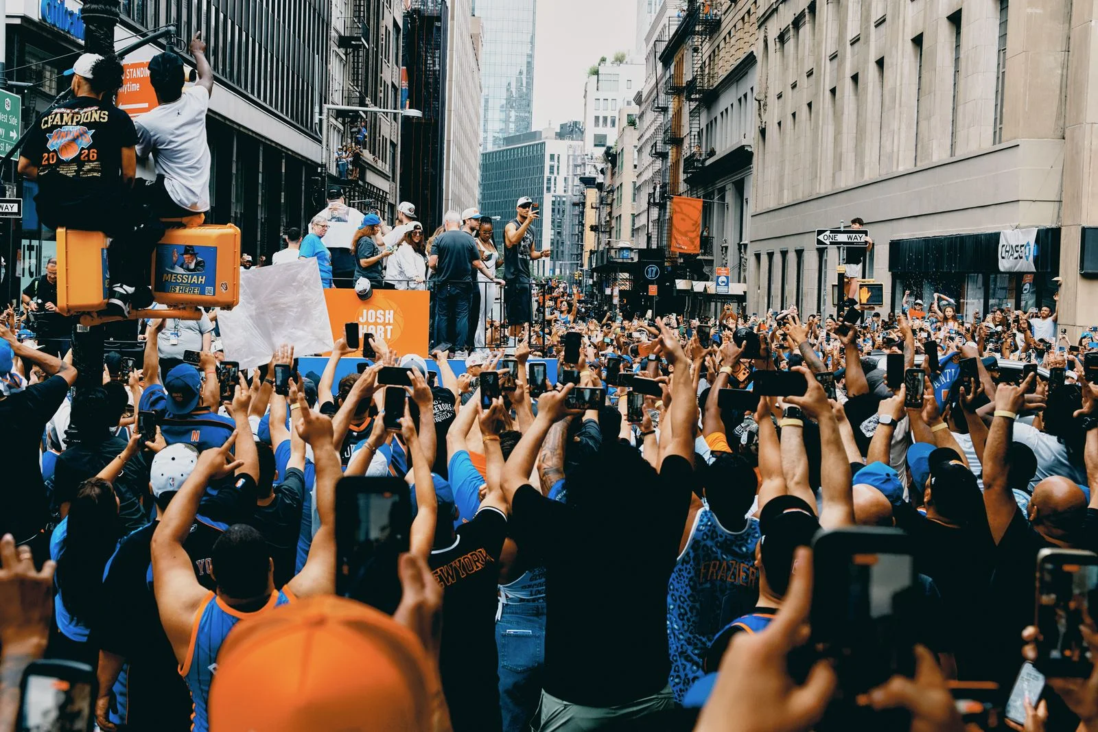 Figures cheer in the streets