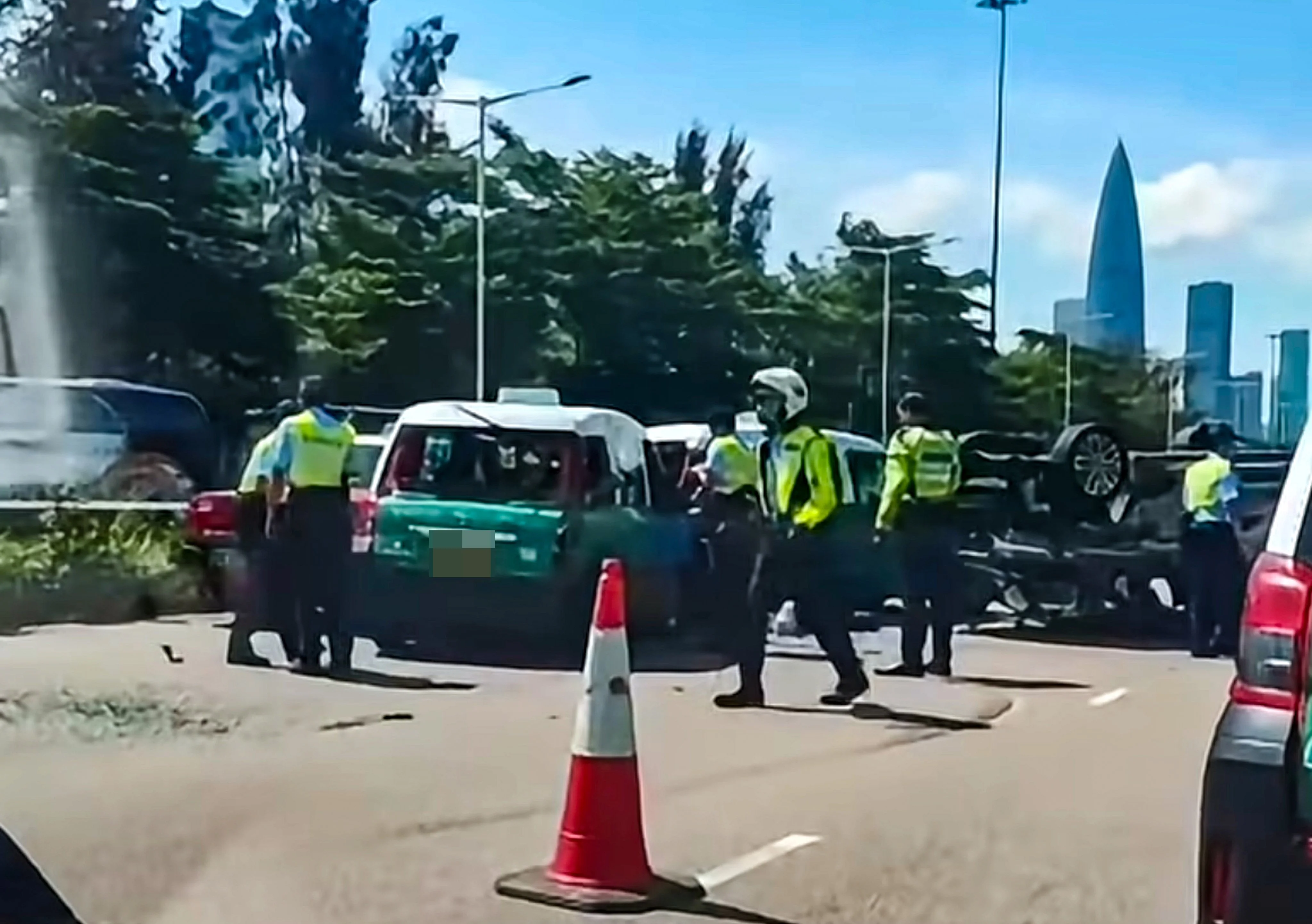 Police investigating at the scene of the accident on Sunday afternoon. Photo: Handout