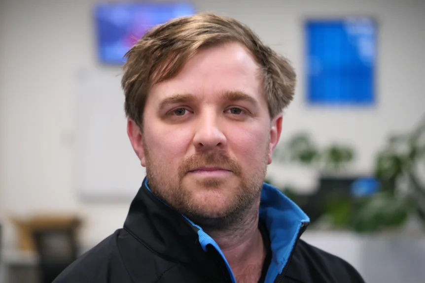 Close-up of a man with a short beard