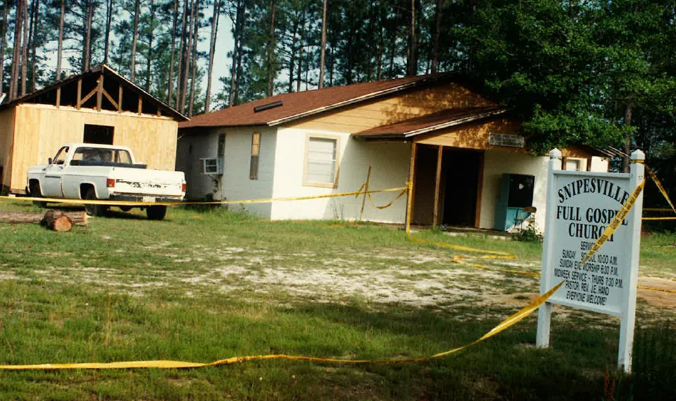 On June 1, 1996, deputies from the local sheriff’s office found Hand’s body with multiple gunshot wounds on the roof of the Full Gospel Church of Snipesville, according to state investigators