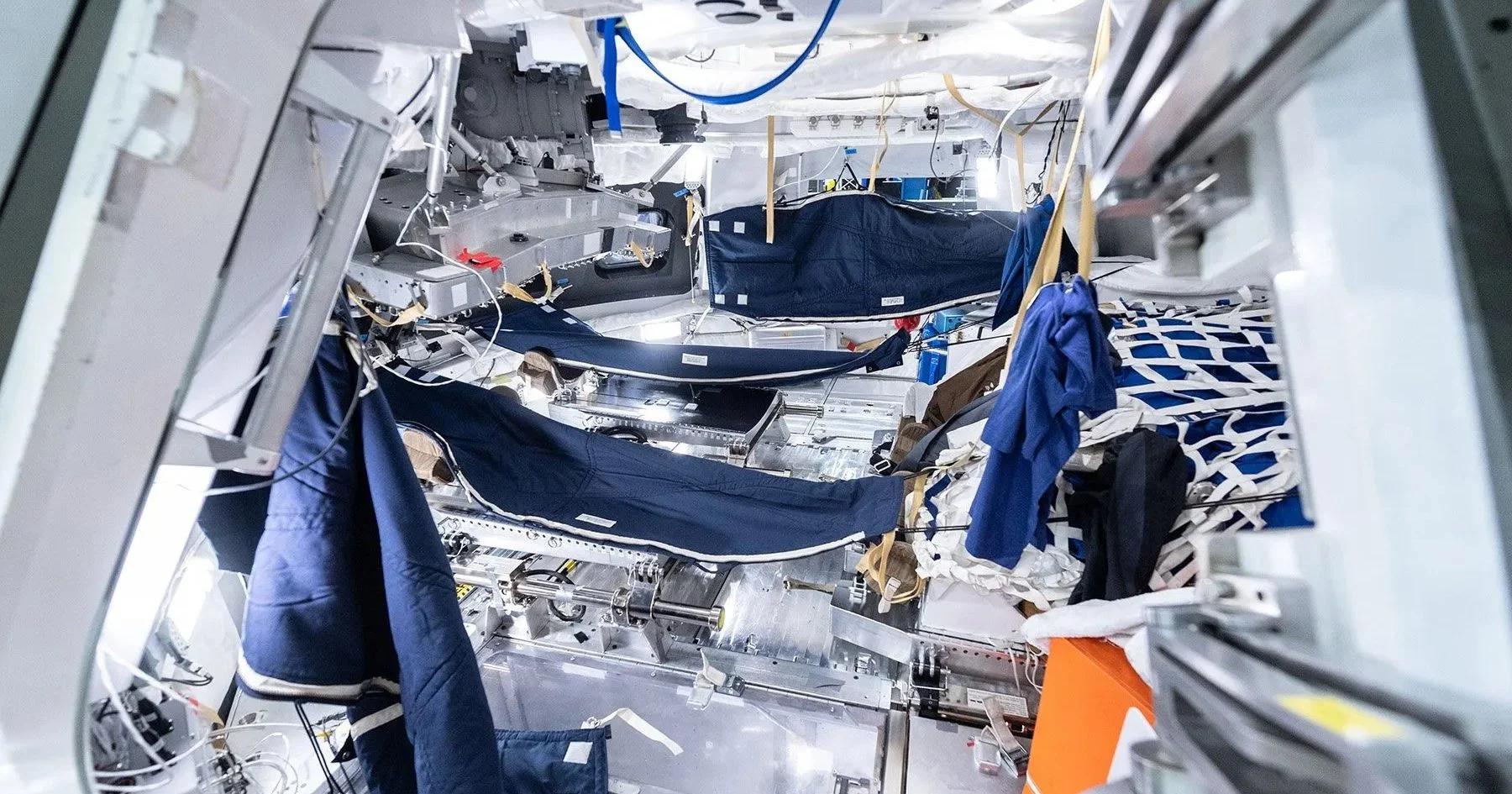 Artemis II crew's sleeping bag configurations being tested in the Orion spacecraft.