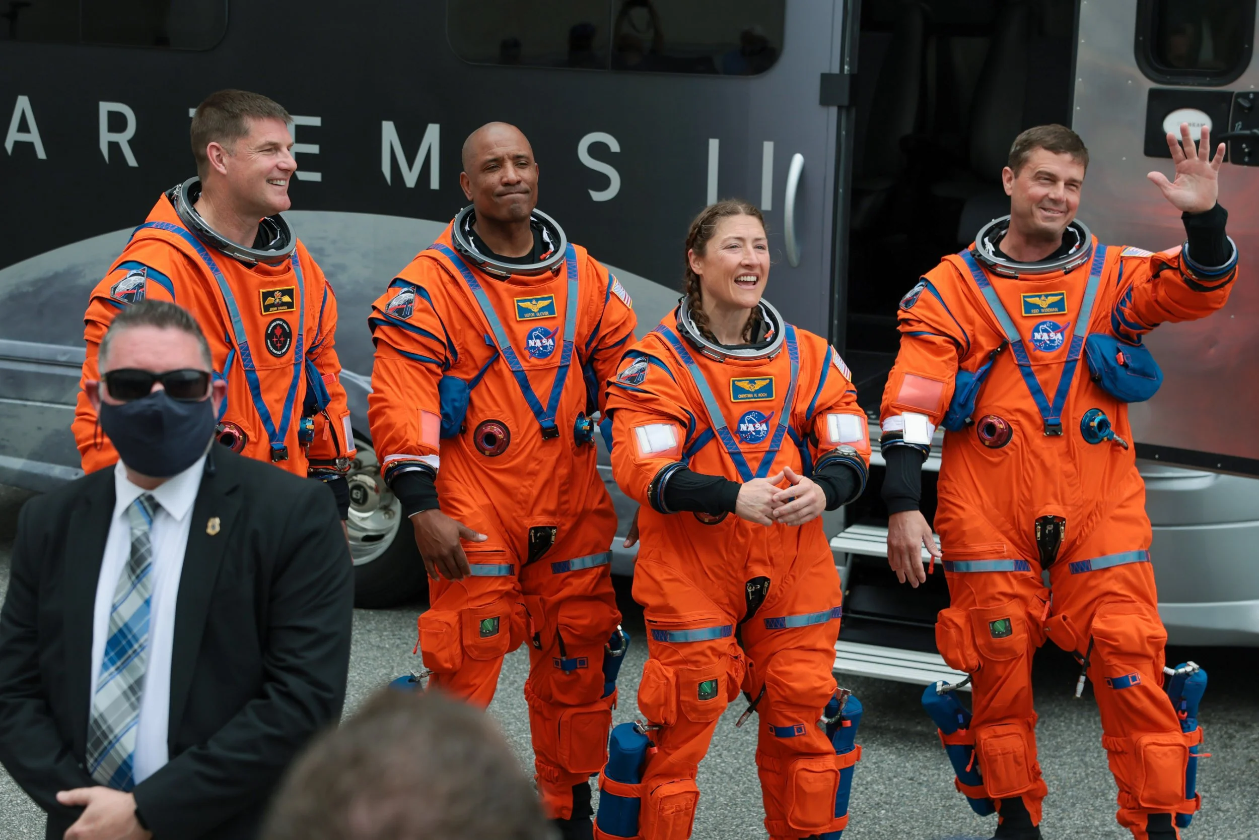 CAPE CANAVERAL, FLORIDA - APRIL 01: (L-R) Mission specialist Jeremy Hansen of CSA (Canadian Space Agency), pilot Victor Glover mission specialist Christina Koch and commander Reid Wiseman walk to an astronaut transfer van as they depart the Neil A. Armstrong Operations and Checkout Building ahead of the launch of the Artemis II at NASA???s Kennedy Space Center on April 01, 2026 in Cape Canaveral, Florida. The 322-foot-tall Artemis II Space Launch System rocket and Orion spacecraft will take the astronauts around the moon and back, 230,000 miles out into space and the farthest any human has ever traveled from Earth. (Photo by Joe Raedle/Getty Images)
