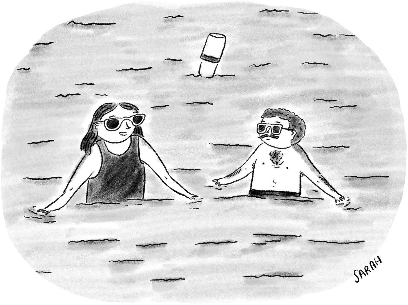Two people standing in water.