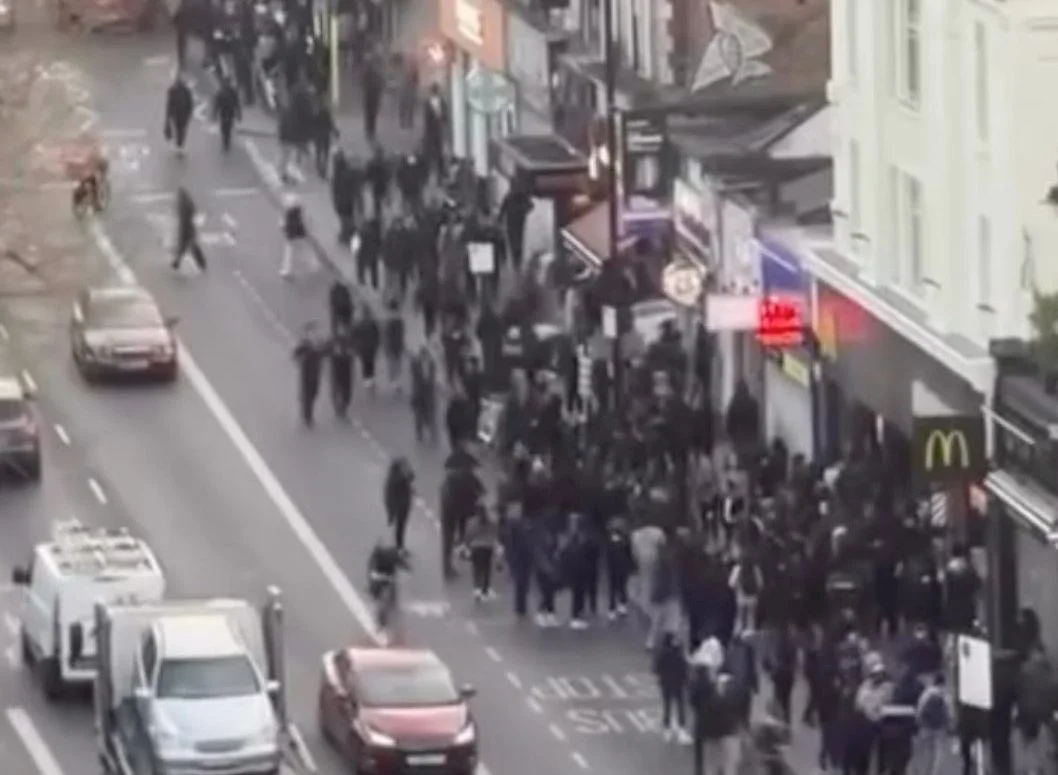 Teenagers swarming shops in Clapham.