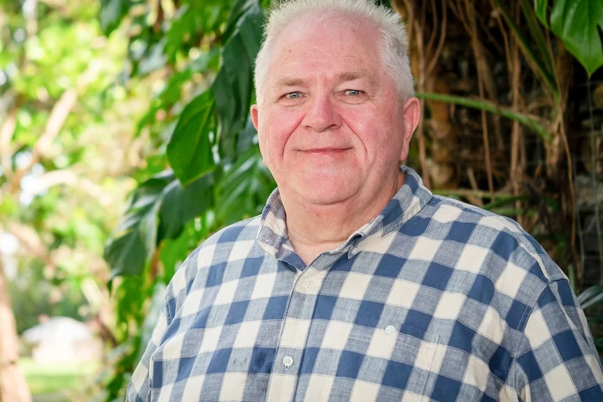 Mark Gregory standing outdoors.