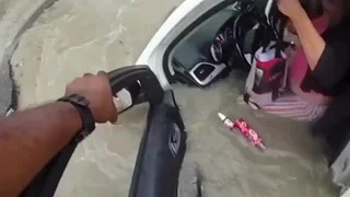 Race to rescue driver after car submerged in sinkhole