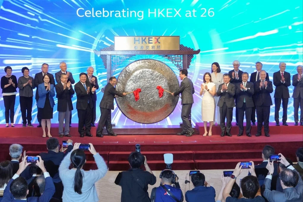 A gong is struck to mark the HKEX’s 26th anniversary at Connect Hall on Friday. Photo: May Tse