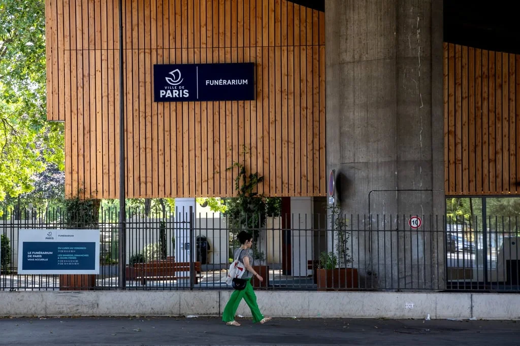 A pedestrian walks outside the Funerarium of Paris in France on Sunday. Photo: EPA A pedestrian walks outside the Funerarium of Paris in France on Sunday. Photo: EPA